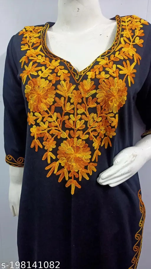 Black wool kurti with yellow Kashmiri embroidery, three-quarter sleeves, ideal for day wear or evening occasions. Handcrafted in India