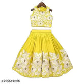 Georgette embellished pithi rasam lehenga-choli for baby girls, intricate Indian embroidery on traditional attire