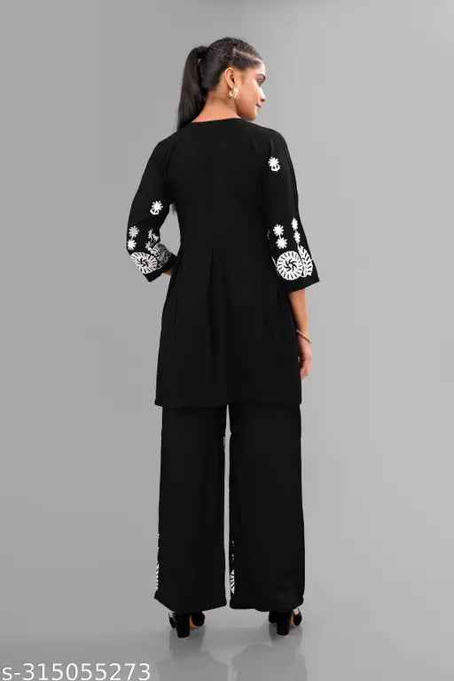 Black Bhavani Fashion Women's Rayon Printed Top & Palazzo Set, embroidered net, calf-length, side slits, suitable for parties or casual wear