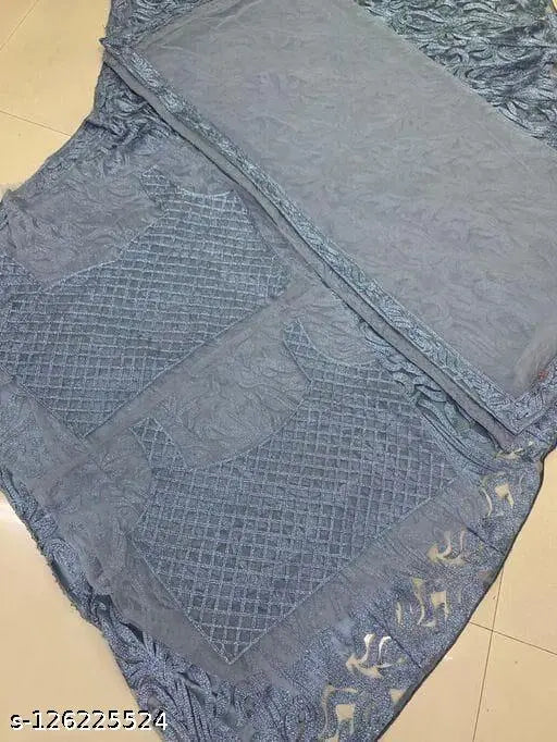 Blue net embroidered lehenga choli dupatta set for women's festive wear, intricately designed with lace drape, handcrafted Indian ensemble