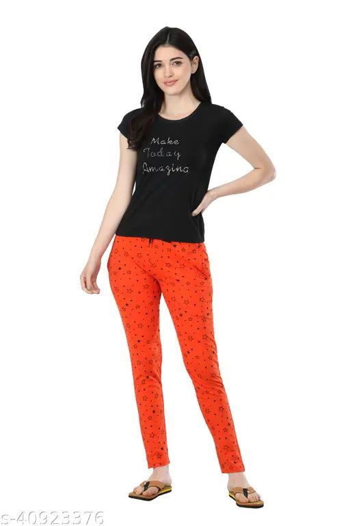 Multicolor cotton printed track pants (pack of 2) for women, ideal for comfort and style. Close-up of vibrant patterned joggers. Sizes: 28, 30, 32, 34, 36 (India)