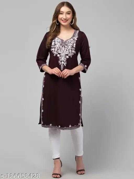 Wine-colored, embroidered woollen work kurta for women. Three-quarter sleeve, straight shape with a calf-length, straight hem. Multicolor, attractive and gorgeous look. Made in India." (125 characters)