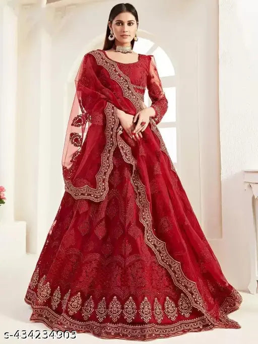 Red net traditional lehenga choli with embroidered chain work, suitable for Indian weddings or festivals