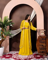 Chic pink georgette crop top & sharara set, embellished with intricate embroidery, modern ethnic elegance