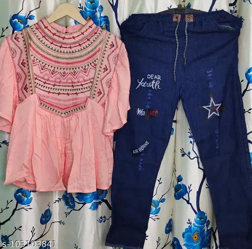 Cotton embroidered top and denim pant combo for women, vibrant color on display