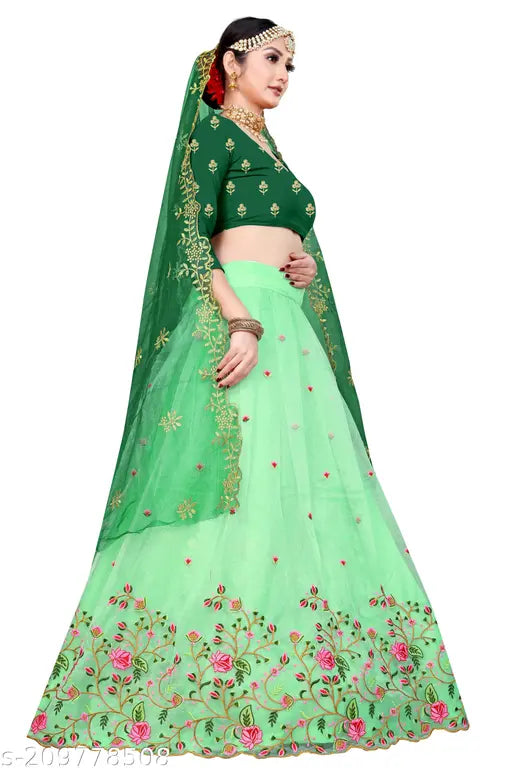 Heavy net embroidered lehenga choli set with dupion silk blouse, heavy net dupatta, intricate thread work and cut work brodery on display