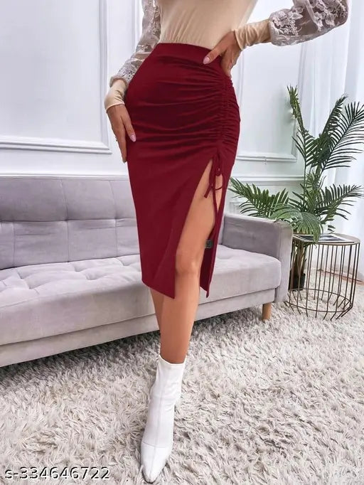 Ruby maroon polyester mid-length skirt, side cut for women. Solid pattern, Indian origin