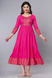 Pink rayon anarkali kurti for women, traditional solid design with multi-color border and gold print