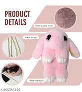 Pink plush bunny sling bag with chain and smooth zipper, features removable strap and single compartment. Realistic design with long ears and realistic eyes, ideal for girls' everyday essentials. Soft fabric cross body & sling bag