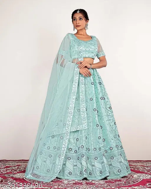 Sky blue embroidered net Lehenga Choli Set with 2.5m dupatta and semi-stitched blouse - India, adorned with golden zari work and four side lace borders