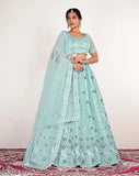 Sky blue embroidered net Lehenga Choli Set with 2.5m dupatta and semi-stitched blouse - India, adorned with golden zari work and four side lace borders