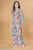 Multi-colored rayon kurta palazzo set for women, featuring three-quarter sleeves and printed design. Indian designer creation for parties, weddings, or daily wear