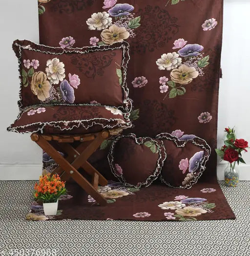 Cotton floral king-size bedsheet set with decorative frills & heart-shaped cushions (India)