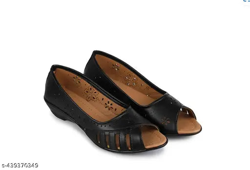Black synthetic ballet shoes, solid design for sizes IND-4 to IND-8 from India