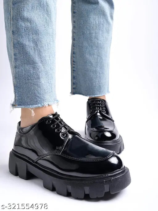 Black patent leather slip-on loafers for women, detailed with lace-up front - Stylestry smart casual loafers, classic ballerina style from India