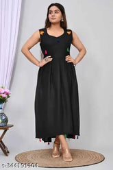 Black rayon blend stitched Anarkali gown with geometric pattern, sleeveless and round neckline, detailed with cotton lace and wooden buttons on front placket and pockets styled with contrast tassels. Indian handcrafted fashion wear