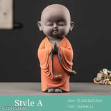Small, laughing Buddha Namaste Monk Statue, handcrafted in India from resin. Perfect addition to living room decor with 13 cm length, 25 cm height, and 12 cm breadth. Exquisitely detailed with spiritual symbolism and a harmonious presence