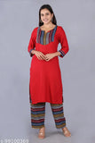 Red rayon kurta with rainbow plazzo pant, striped net design by Indian designer" (124 characters)