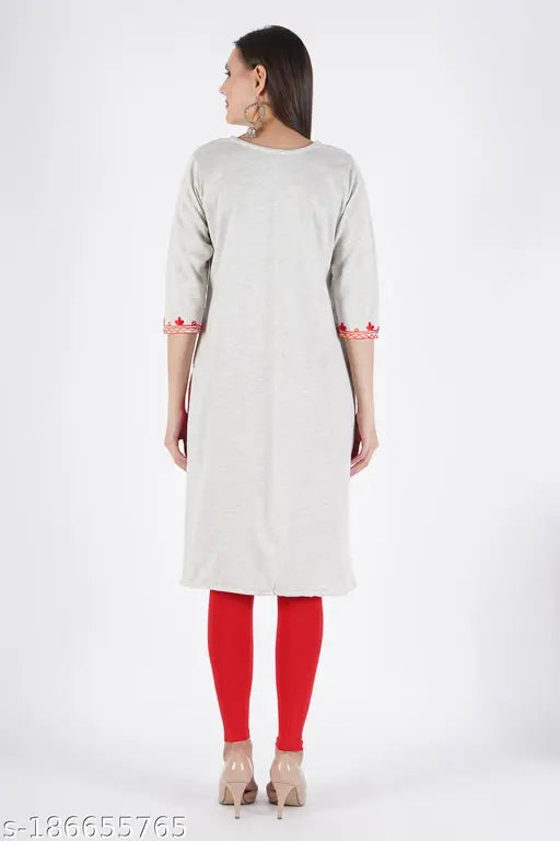 Wool embroidered Aari work kurta in white, three-quarter sleeve for women. Fashionable woolen fleece party dress with multicolor embroidery, made in India