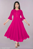 Trendy pink rayon flared kurti, 3/4 sleeve length, solid pattern for women's casual and formal wear. Hand wash or machine wash care