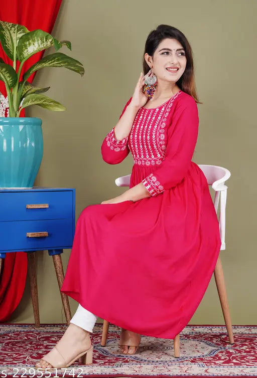 Embroidered rayon kurti with three-quarter sleeves, Indian embroidery fashion on model
