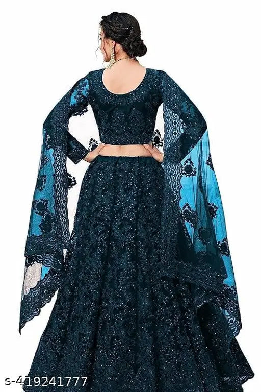 Fashionable heavy flow net lehengha choli, embroidered with Indian zari. Perfect for Bollywood-inspired Gujarati weddings