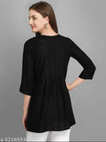 Black embroidered rayon women's tunics - Solid, three-quarter sleeve top in black rayon with enzyme treatment. Breathable fabric allows air circulation and keeps you cool. Indian-made fashion for everyday wear, perfect with jeans and sneakers