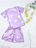Heart print lavender color silk blend night suit set for ladies, featuring a t-shirt, pajama, and shorts with drawstring elastic waistbands. Made in India