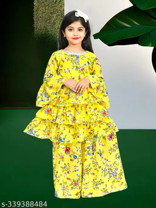 Printed chiffon girls' casual kurta and sharara set, A-line top with three-quarter sleeves. Comfortable for summer wear, best for parties. Sizes: 1-2 Years - 6-7 Years. Made in India