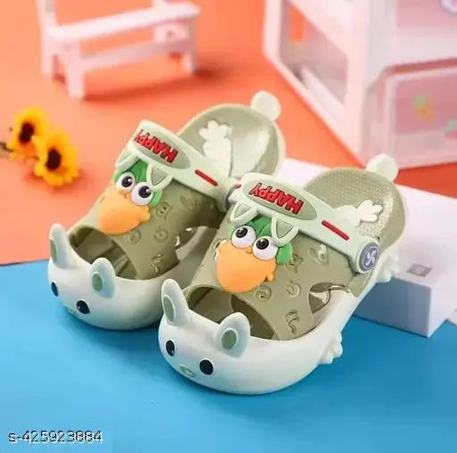 Slip-on FASMANIA Tom Sticker Clogs for Kids - Lightweight and breathable PVC sandals, perfect for playtime on land or water. Solid color design with adjustable back strap