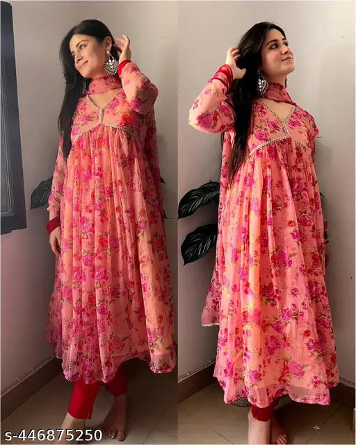 Exquisite printed Georgette georgette gown with flower print, 3/4 sleeves and fancy round neck, from DHYAN FASHION HUB. Cotton lining, samosa design lace border, umbrella flair, standard stitching. Comes with contrast matching silk dupatta