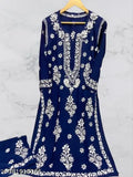 Embroidered rayon Chikankari work kurti and palazzos set, three-quarter sleeves, Indian traditional clothing on display