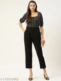 Black & White striped basic jumpsuit by Magnetic Designs, crepe fabric with short sleeves, on model standing