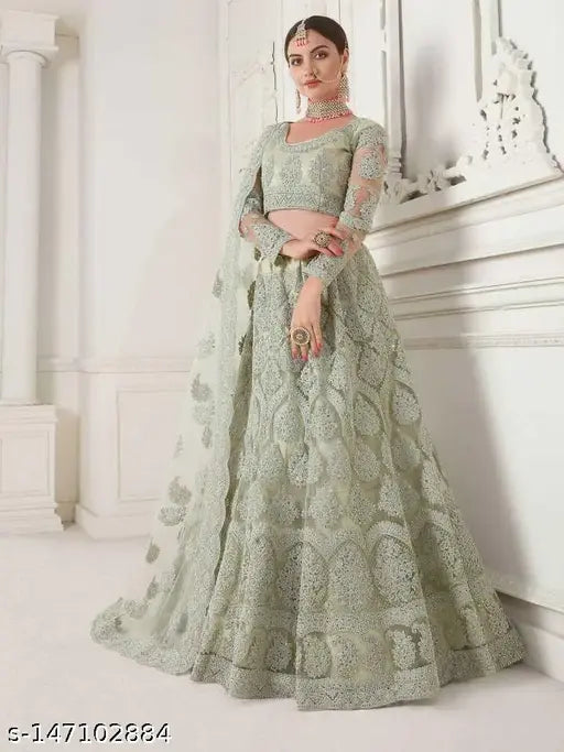 Trendy attractive net lehenga-choli set with embroidered top and dupatta, suitable for festivals, free size (waist: 42in, length: 42in, dupatta length: 2.25in), handcrafted in India