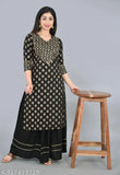 Black rayon straight kurta with skirt set featuring gold print gota lace, 3/4th sleeves, knee-length, ideal for casual and evening wear. Authentic Indian fashion from Liyara brand