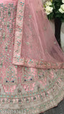 Heavy pink net lehenga choli with embroidery work, semi-stitched blouse and dupatta. Ideal for festive occasions - Indian party wear