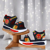 Stylish canvas and rubber sandals for kids (printed net design), suitable for boys and girls aged under 200 and 300. Available in black and red color options