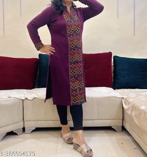 Woolen winter kurti with Kullu patti design, perfect for office wear in chilly weather. Solid knit, made in India." (124 characters)