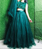 Green mehendi acrylic-net lehenga choli set, featuring semi-stitched ruffle choli (38in/42in), net dupatta (2.5in/2.5m), and sequined balaus. Ideal for haldi, mehndi functions, weddings, festivals, and special occasions. Made in India