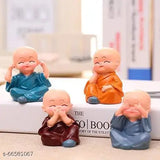 Multicolor handcrafted polyresin monk showpiece set of 4, intricate artifact detail on display stand, originates from China