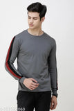 Solid grey cotton long-sleeve men's round neck t-shirt, grey on model, versatile casualwear