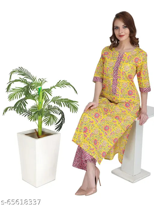 Yellow printed kurta palazzo set, 100% organic cotton, three-quarter sleeves, handcrafted by UBUNTU FASHION, summer garden party attire with butterfly embroidery