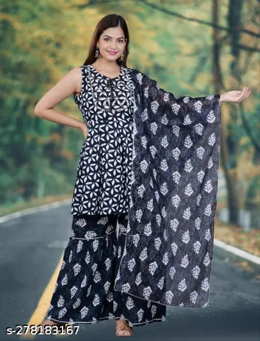 Black rayon sharara set with kurta and dupatta, sleeveless, printed net design on display