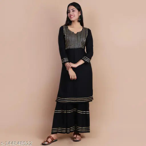 Rayon Hyten kurta sharara with gota lace, solid-colored Indian traditional outfit for women