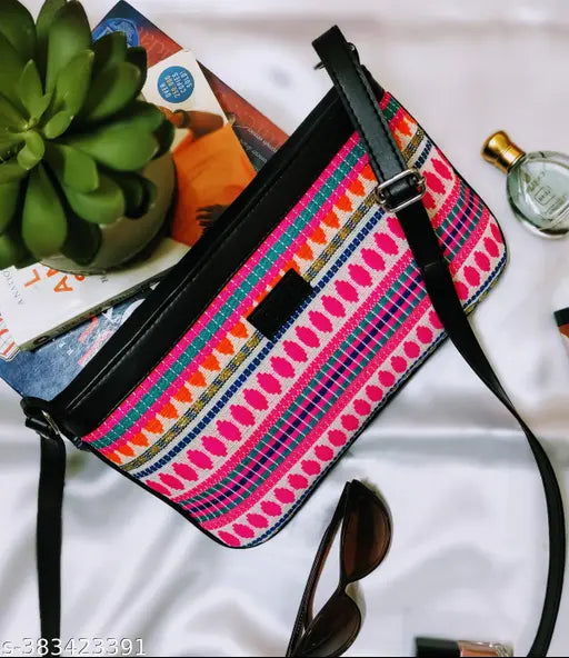 Smart fabric sling, adjustable strap with zip top closure and back pocket. Convenient daily use accessory for essentials storage. Made in India