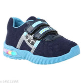 Sky blue unisex kids running shoes with Velcro closure. Mesh upper and PVC sole. Comfortable and durable sports footwear by LEVOT." (109 characters)