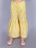 Yellow cotton paisley print Anarkali/Flared Kurta & Sharara Set for girls, featuring intricate embellishments and a charming modern style. Perfect for special occasions or festive celebrations, available in sizes 2-3 Years to 9-10 Years. Indian-made