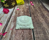Off-white marble God Idol Charan Paduka (7x7cm), handcrafted and glossy pink, for temple or home puja shrine