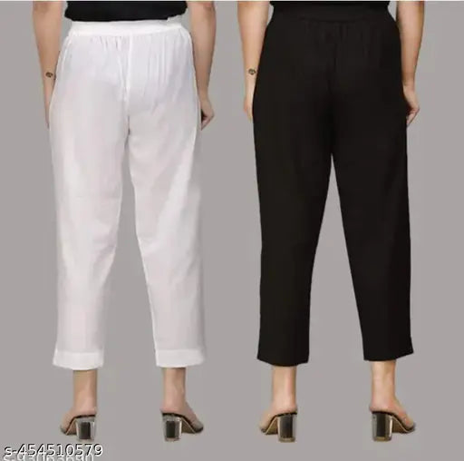 Black & white cotton women's trouser combo set, solid pattern with pockets. Two pieces per set, sizes S-XXXL. Indian origin