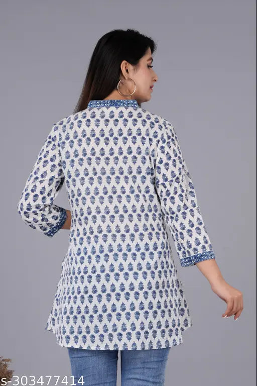 Indigo blue printed pintuck top with embroidered net pattern, cotton material, three-quarter sleeves. Perfect for women's casual wear